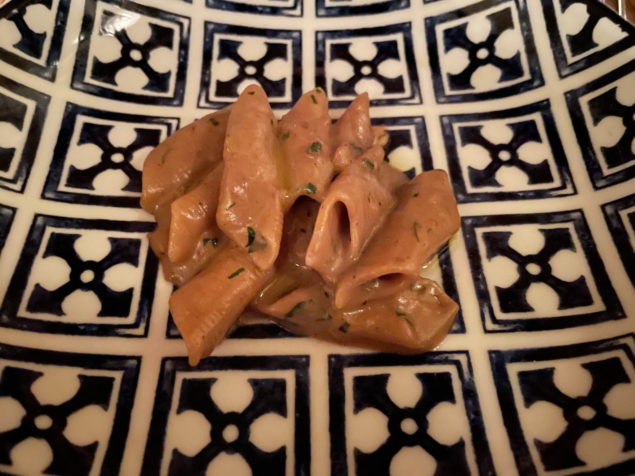 Penne shaped pasta with mushroom cream sauce